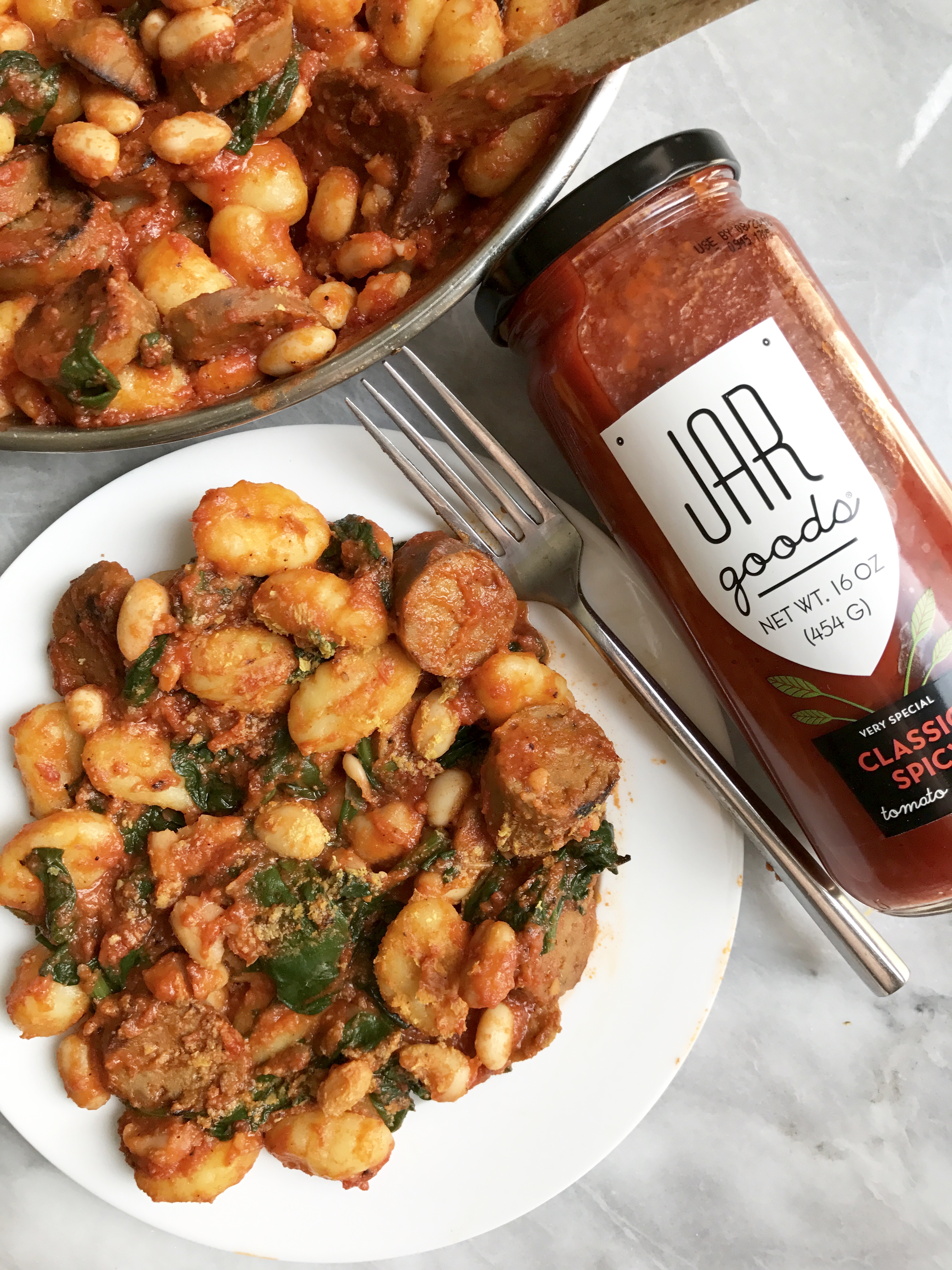 Spicy Tomato Gnocchi With White Beans, Spinach & Vegan Sausage