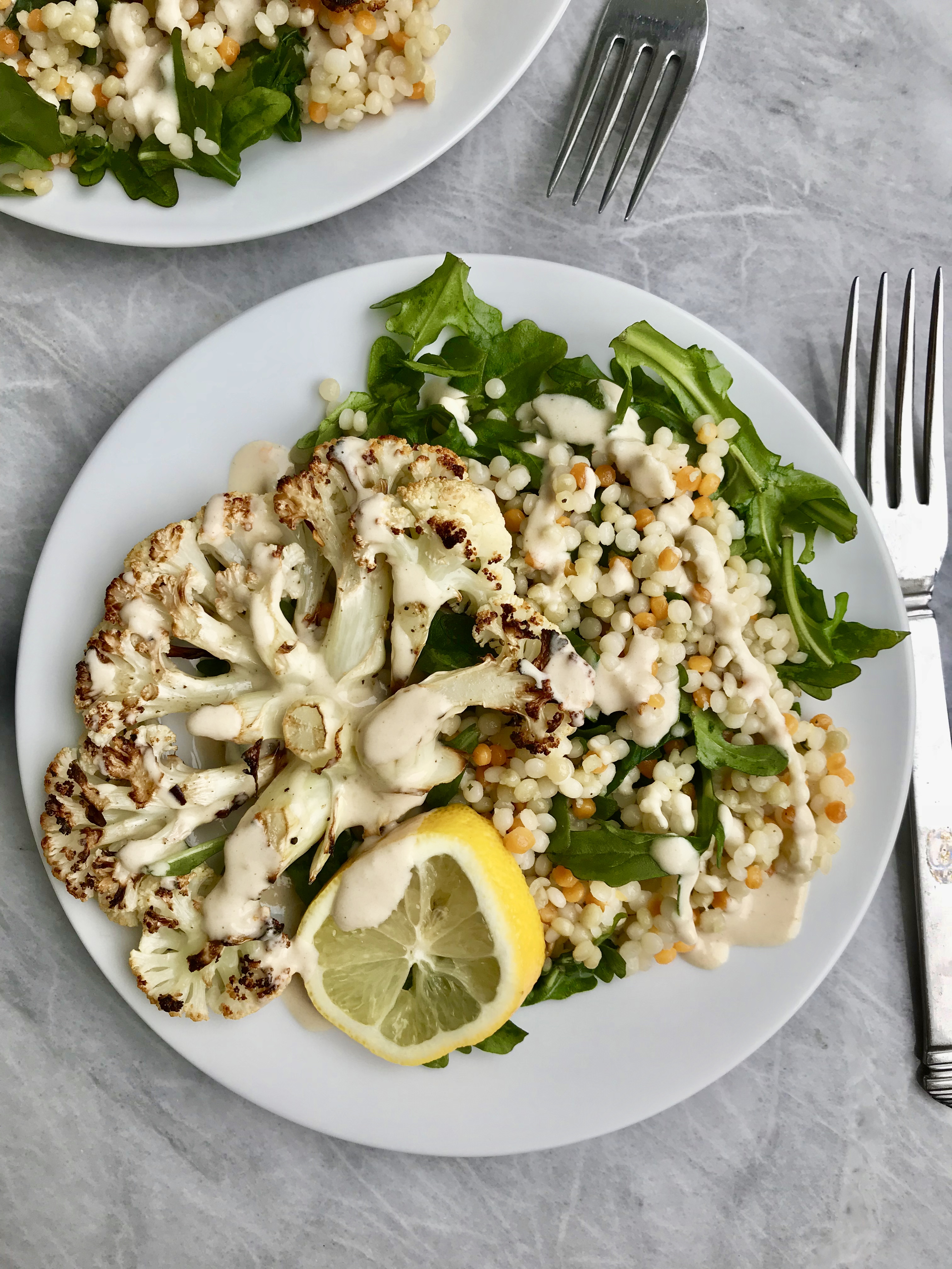 Cauliflower Steaks with Pearled Couscous Salad & Tahini Dressing.